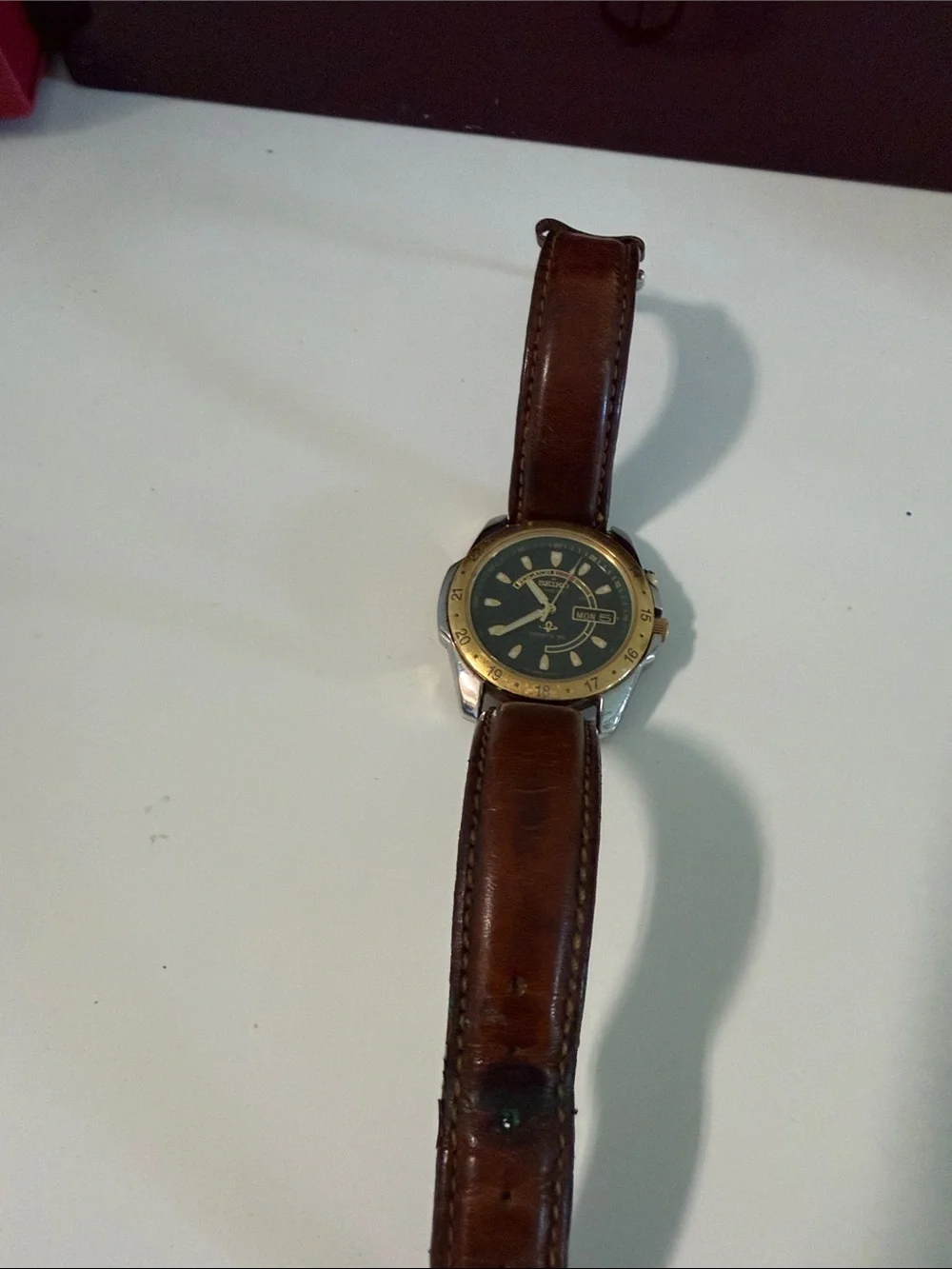 Seiko Men's Watch with Brown Leather Strap and Gold Bezel